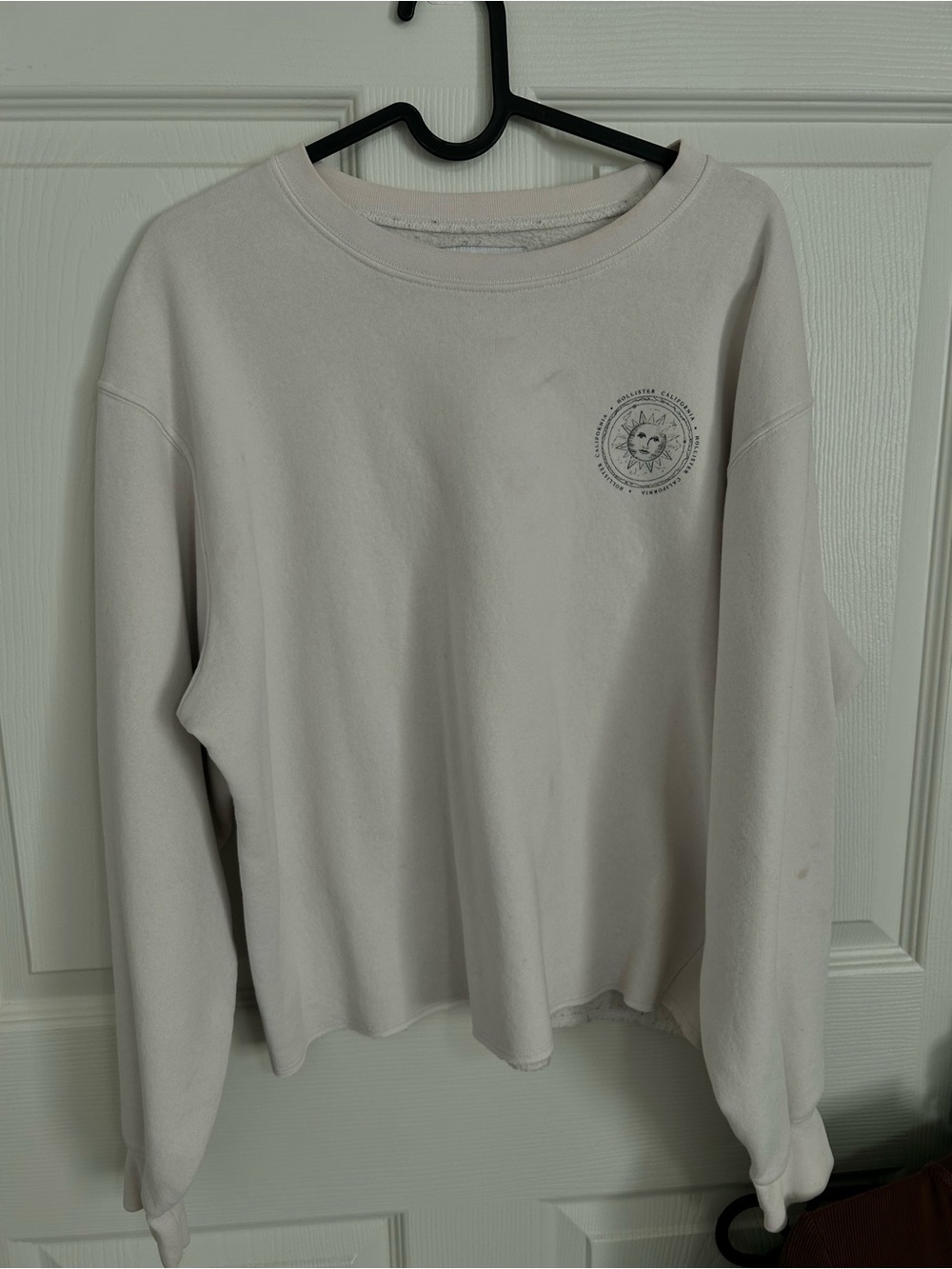 Hollister Light Beige Crewneck Sweatshirt with Small Sun Emblem